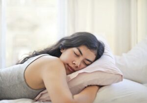 woman sleeping on stomach