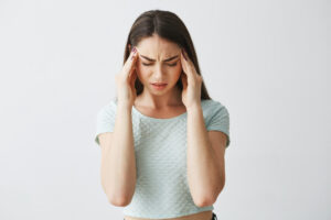 Woman Suffering from Headache